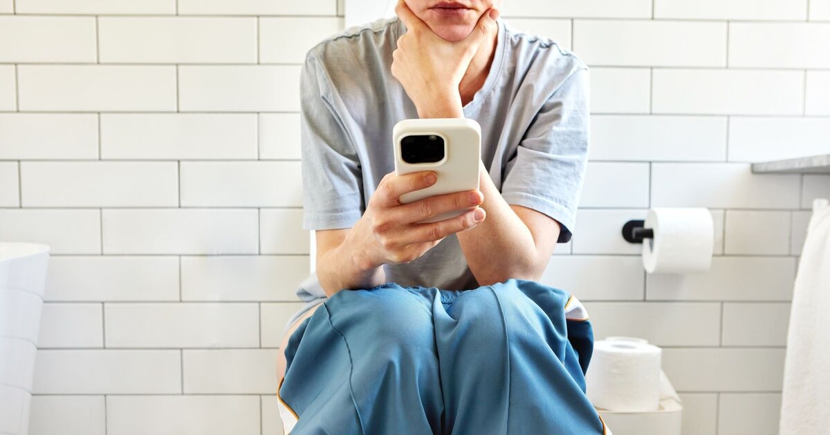 The seven health reasons why to stop using your phone on the loo