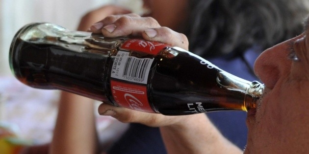 After a deal with Coca-Cola, Mexico agrees to lower taxes on soft drinks.
